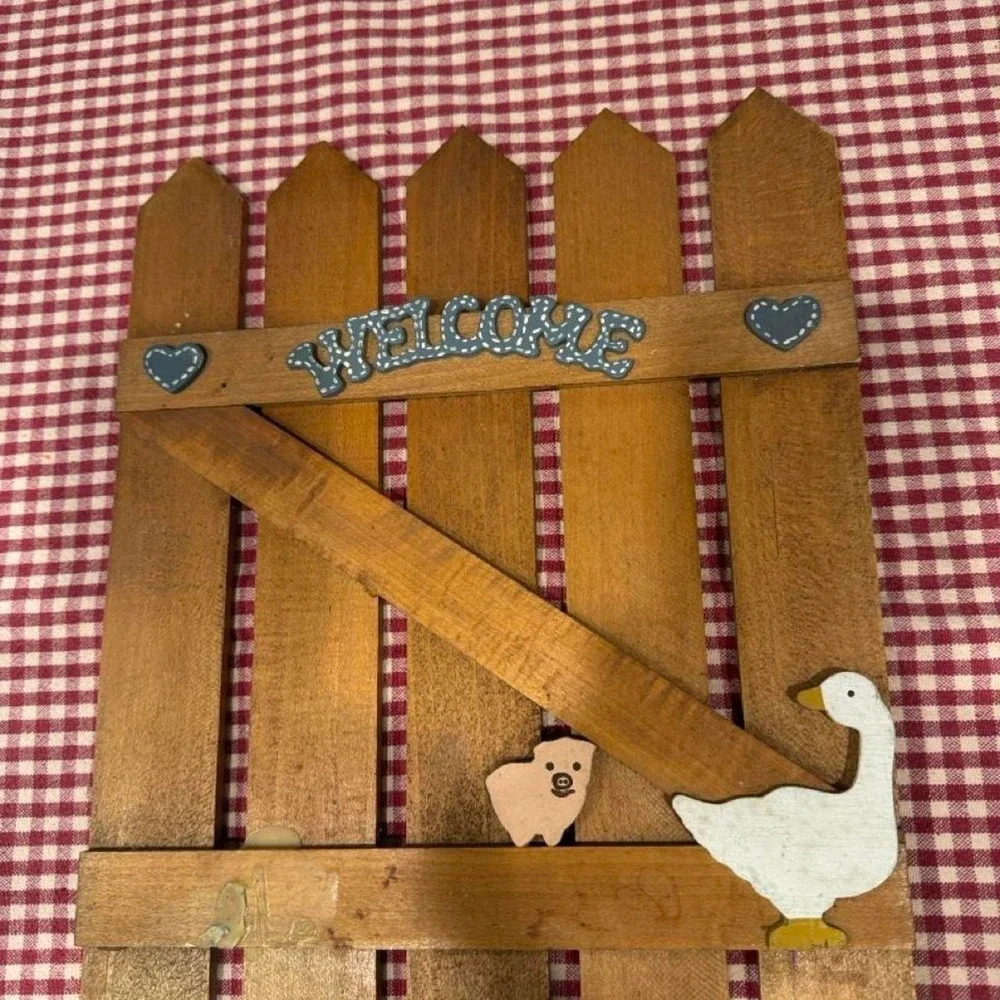 Vintage wooden goose welcome fence sign with goose and pig